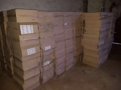 На Донбассе в "серой зоне" обнаружили склады с контрафактными сигаретами 