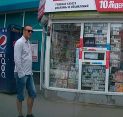 В Луганске среди белого дня у местного жителя из машины вытащили iPod