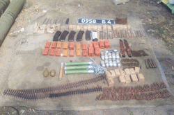 На Луганщине правоохранители выявили еще два тайника с боеприпасами и оружием (фото)